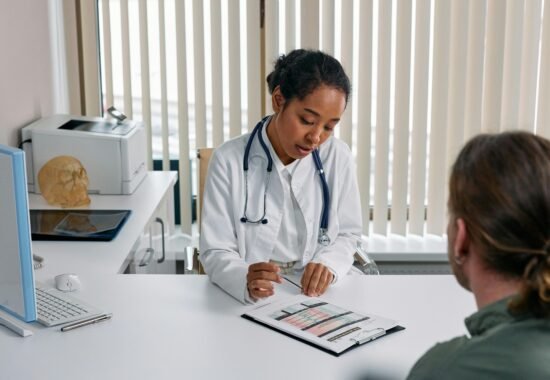 Doctor reviewing patient's notes